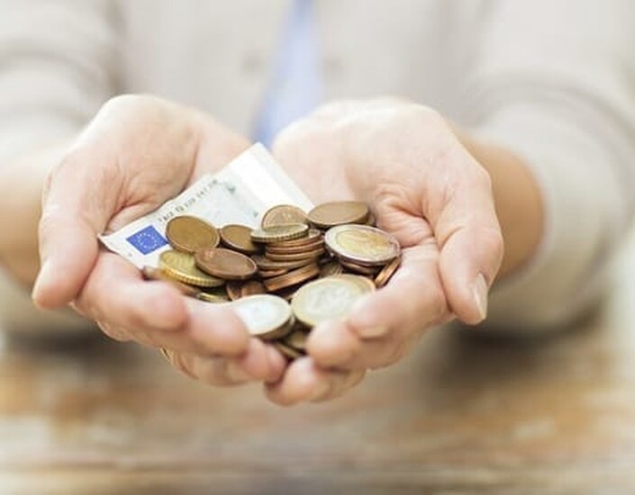 Handen met geld